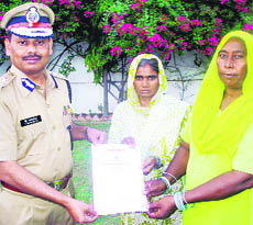 IGP V. Kamaraja felicitates Kanta and Kailash. 