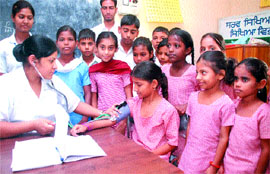 Schoolchildren undergo check-up at a camp organised as part of the Child Healthcare Awareness Programme at Government Elementary School in Lambra on Thursday.