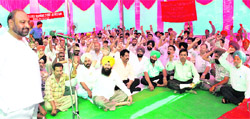 A trade union leader addresses a dharna of loco running staff to press for acceptance of pending demands in Ludhiana
