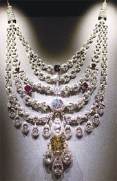 A platinum, diamond, ruby and topaz Cartier necklace from Paris dated 1928 is pictured during a photocall for the 'Maharaja: The Splendour of India's Royal Courts' exhibition in London. The exhibition plans on bringing together over 250 objects, many being lent from Indias royal collections for the first time. The exhibition will run from October 10 to January 17, 2010.