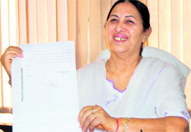 SDM, Mohali, Raghbir Kaur Khera, shows the stay orders of the Punjab and Haryana High Court at the district administrative office.
