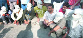 The seven highway robbers who were arrested by the Delhi police on Friday. 