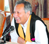 Vijay Singh Mankotia, a former minister, addressing the media at Shimla on Friday.