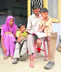Vijay Kumar of Bula Chak village of RS Pura, lost his leg when he rushed to help Manjit Singh, who was injured in a landmine blast