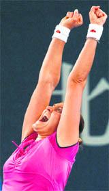 Nadia Petrova celebrates after beating Peng Shuai at the China Open on Friday. 