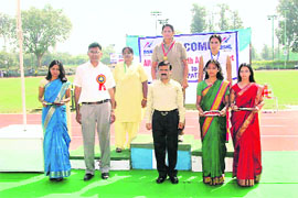 Winners of the BSNL Athletics Meet with their medals in Patiala on Saturday.