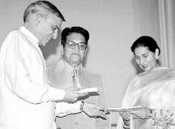Pawan Bansal, Union Cabinet Minister for Parliamentary Affairs and Water Resources, and Perneet Kaur, Union Minister of State for External Affairs, release a book on cancer by Prof SM Bose at Bhargava Auditorium, PGI, Chandigarh, on Saturday.