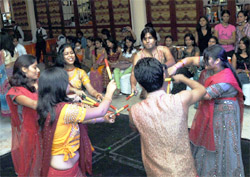 Residents of Gurgaon play dandiya at a Divali mela in Sector-29, Gurgaon,