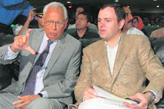 Governor NN Vohra shares a point with Chief Minister Omar Abdullah during the 35th All India Sociological Conference at Kashmir University in Srinagar on Saturday.