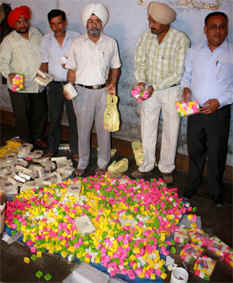 Health department officials of Bathinda district with the adulterated sweets that were seized on Sunday. 