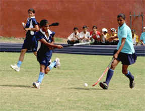 A match in progress on the inaugural day of the three-day Punjabi University Inter-college Hockey Championship in Bathinda on Sunday. 