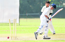 A Rajkumar College batsman bowled by Daly College team during a match at Mohali on Sunday.