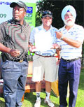 From left: Ambassadors Jonathan (Zimbabwe) and Voroshilov Enkhbold (Mongolia) with BS Gill who scored a hole-in-one in the PHD Chamber Golf Tournament at the Chandigarh Golf Club on Sunday