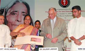 Lok Sabha Speaker Meira Kumar releases a commemorative postage stamp on Padma Bhushan Dineshnandini Dalmia, as Madhya Pradesh Governor Balram Jakhar and minister of state for communication and IT Sachin Pilot look on, in New Delhi