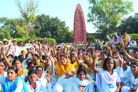 Members of the Catholic Yuva Dhara pay tributes at the Jallianwala Bagh in Amritsar on Saturday.