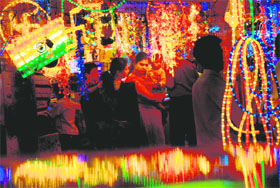 Fancy lights lend a festive touch ahead of Diwali at an electronics market in Chandigarh on Monday.