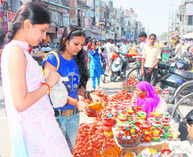 Markets wear a festive look ahead of Diwali in Karnal. 