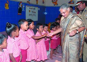 Chief Minister Sheila Dikshit meets children of prisoners at Central Jail, Tihar, in Delhi