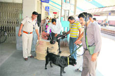 Policemen check luggage at the railway station in Roorkee on Tuesday.