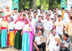 NO WORK, NO VOTE: Voters of Khoh village in the Pataudi constituency of Gurgaon district stage a protest demonstration after boycotting the assembly elections