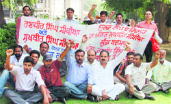 Residents protest against the police outside the Deputy Commissioners office in Ludhiana on Tuesday.