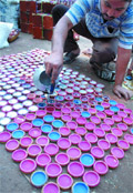 A potter prepares diyas at Sarojini Nagar market in New Delhi 