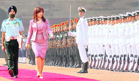 Argentina President Cristina Fernandez de Kichner inspects a guard of honour during a ceremonial 