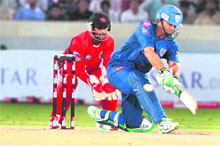 Adam Gilchrist play a shot against Trininad and Tobago in Hyderabad on Wednesday. 
