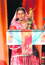 Veero receives the Frederick Douglass award at the 2009 Freedom Awards in Los Angeles on Tuesday.