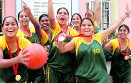 Winners of a basketball meet at Guru Gobind Singh College, Sector 26, in Chandigarh on Thursday.