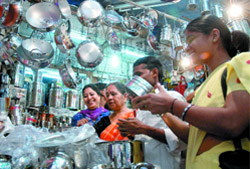 Women buy utensils on the occasion of Dhanteras ahead of Divali in New Delhi 