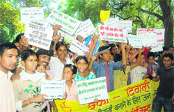 Students participate in a rally to appeal people to celebrate an eco-friendly Diwali to preserve the environment of Dehradun at the Gandhi Park on Thursday.
