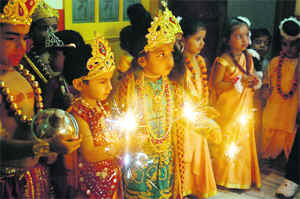 Pupils of Radiant Kids Playway School celebrate Diwali in Bathinda on Thursday.
