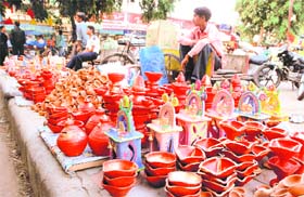 Vendors display diyas on the eve of Diwali in Chandigarh