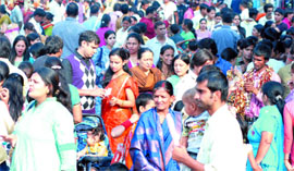 Divali shoppers crowd markets on the eve of the festival of lights.