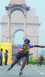 A boy on roller-skates on the occasion of World Food Day at India Gate in New Delhi on Friday.