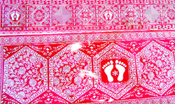 Aipan murals made by Kumaoni women in their homes for Diwali. 