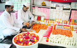 Inmates of the Amphala district jail busy making candles in Jammu.