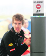 Red Bull Formula One driver Sebastian Vettel arrives for the first free training session in Sao Paulo