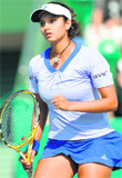 Sania Mirza reacts after getting a point against Marion Bartoli