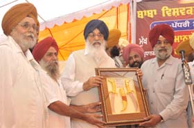 Chief Minister Parkash Singh Badal at a function to mark the birth anniversary of Lord Vishwakarma in Moga