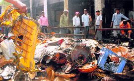 Damaged goods after the fire in grain market, Chandigarh.