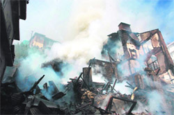 A view of Krishna Building which was destroyed in a fire at Sanjauli in Shimla