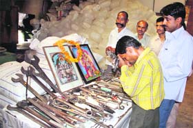 Workers worship tools at the Gangyal factory on the occasion of Vishwakarma Day at Jammu