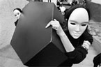 Activists of Amnesty International demonstrate carrying makeshift coffins, symbolising poverty, during a rally marking the International Day for the Eradication of Poverty in Lima, on Saturday.