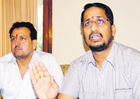 Anil Joshi, BJP MLA (right), speaks to mediapersons in Amritsar