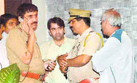 Police officials at the site of the crime in Panchkula on Tuesday.