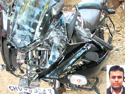 The damaged motorcycle of the deceased (inset) at the Sector 11 police station in Chandigarh on Tuesday.