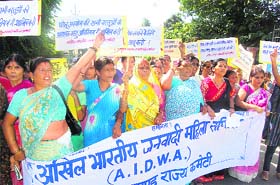 Activists of the All-India Democratic Womens Association demonstrate in front of the Secretariat in Dehradun