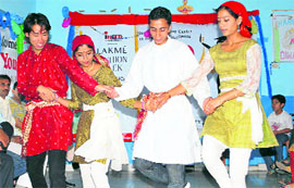 INIFD students showcase Himachali dresses during a folk dance competition in Diwali carnival at Hamirpur.
